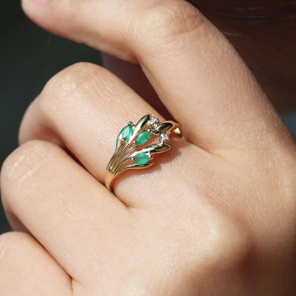 floral-marquise-emerald-diamond-ring-in-9ct-yellow-gold-11240 on model