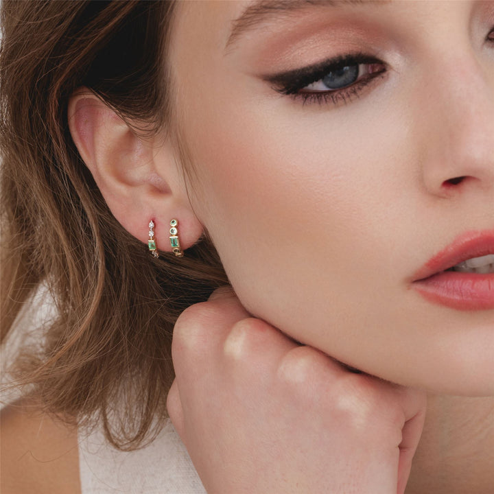 classic-emerald-half-eternity-hoop-earrings-in-9ct-yellow-gold-135e1885019 on Model