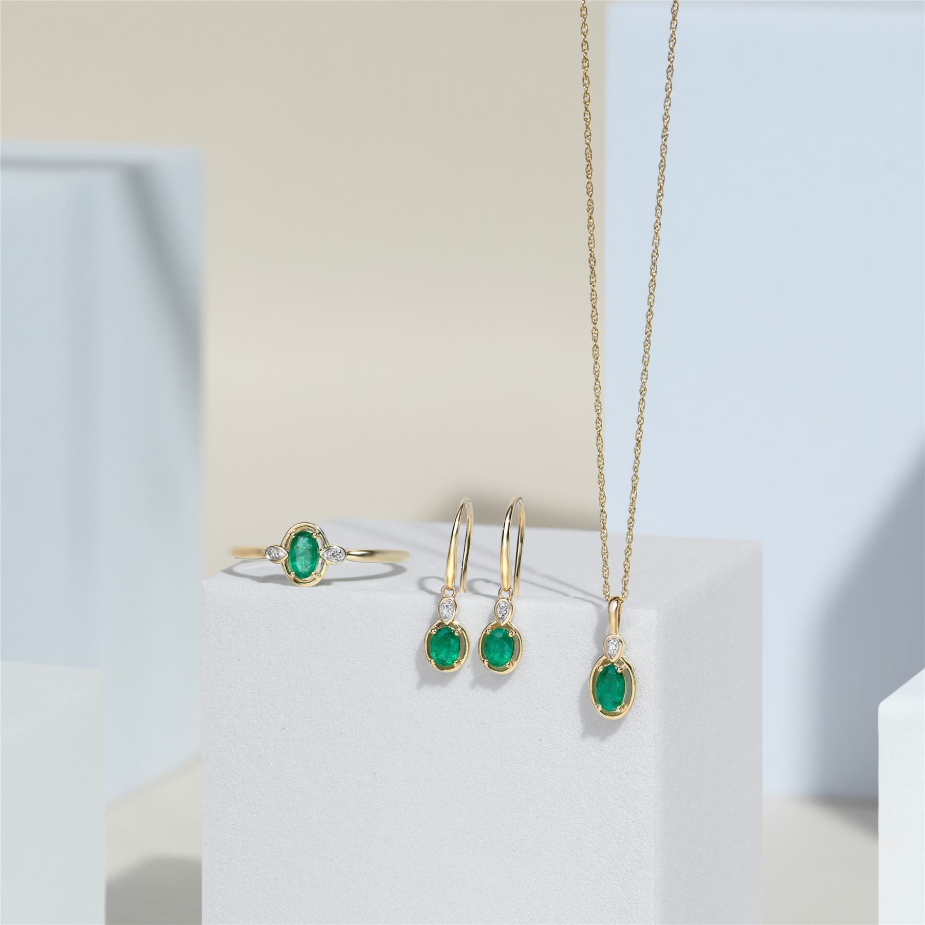 Classic Oval Emerald & Diamond Ring In 9ct Yellow Gold