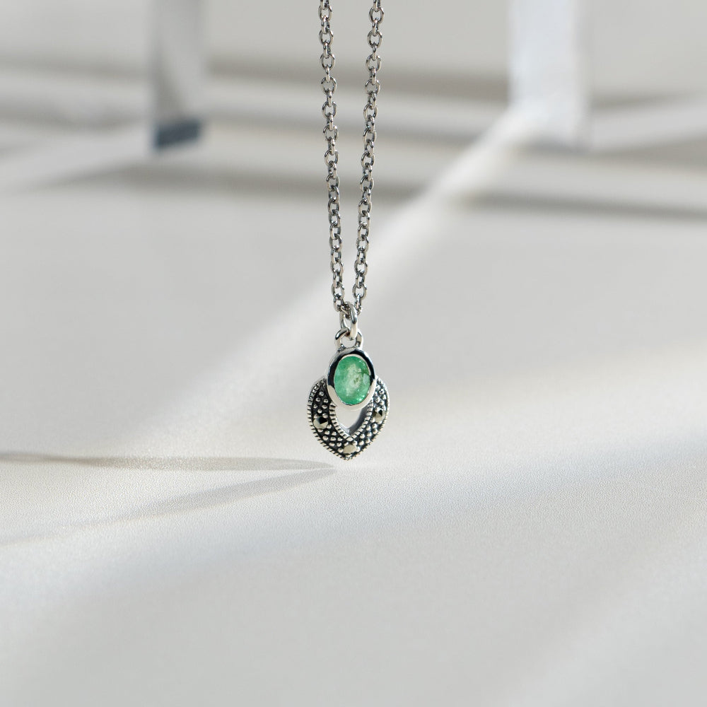 Art Deco Style Oval Emerald & Marcasite Necklace in 925 Sterling Silver flatlay