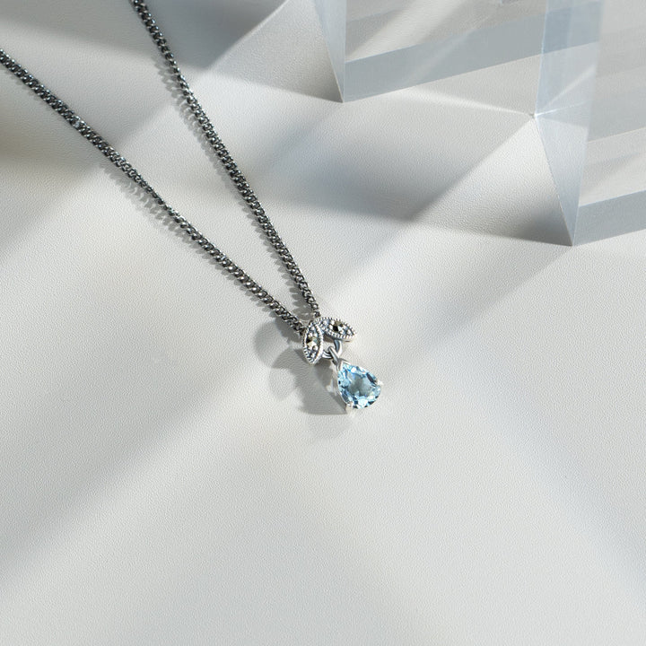 Art Nouveau Style Pear Aquamarine & Marcasite Pendant in 925 Sterling Silver flatlay
