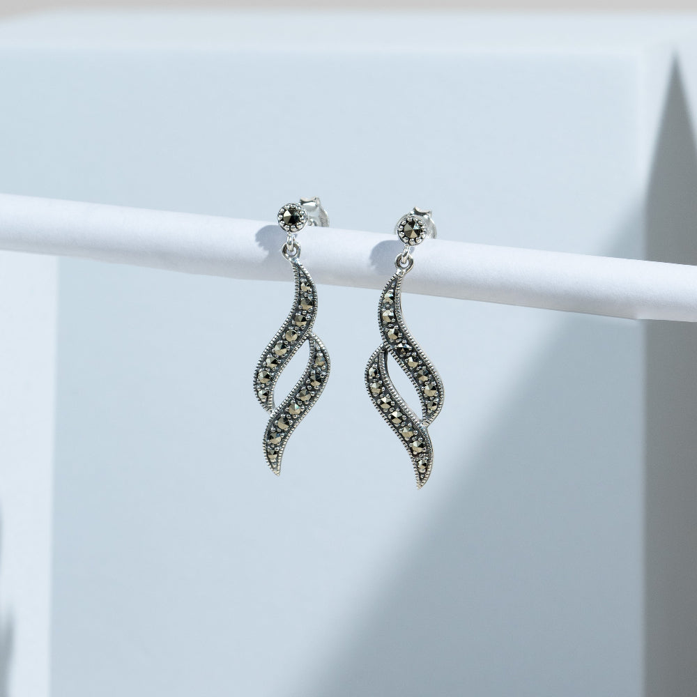 Art Nouveau Style Round Marcasite Swirl Drop Earrings in 925 Sterling Silver flatlay