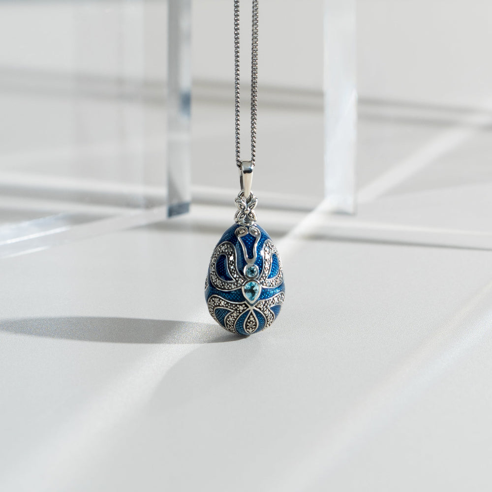 Art Nouveau Style Pear Blue Topaz Egg Pendant flatlay