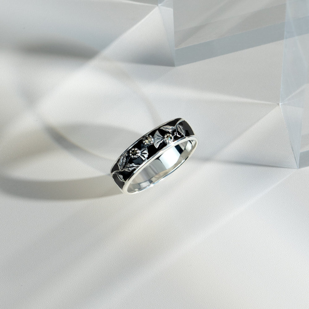 Floral Round Marcasite & Black Enamel Thisstle Band Ring in 925 Sterling Silver flatlay