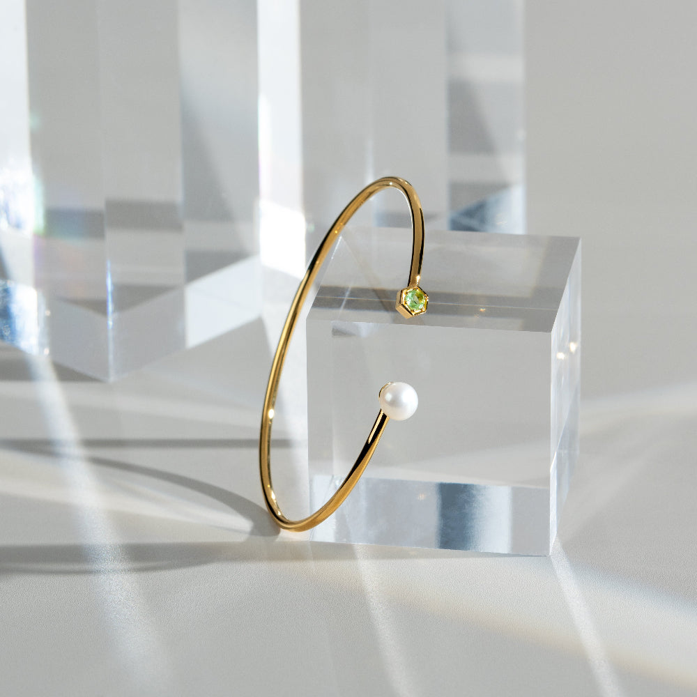 Geometric Pearl & Peridot Open Bangle in Gold Plated Silver flatlay