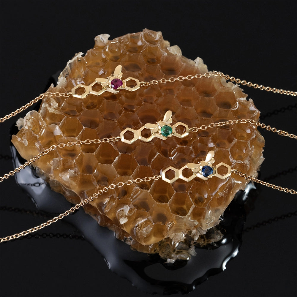 Honeycomb_emerald_ruby_and_sapphire_bracelets_in_9ct_yellow_gold