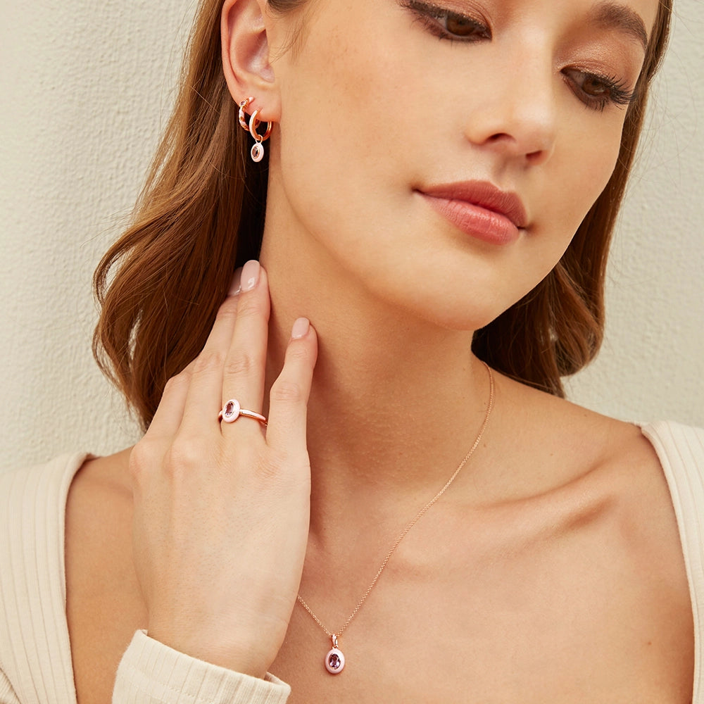 Siberian_Waltz_Violet_enamel_and_pink_amethyst_ring._hoops_earrings_and_pendant_necklace_in_rose_gold_plated_sterling_silver_model