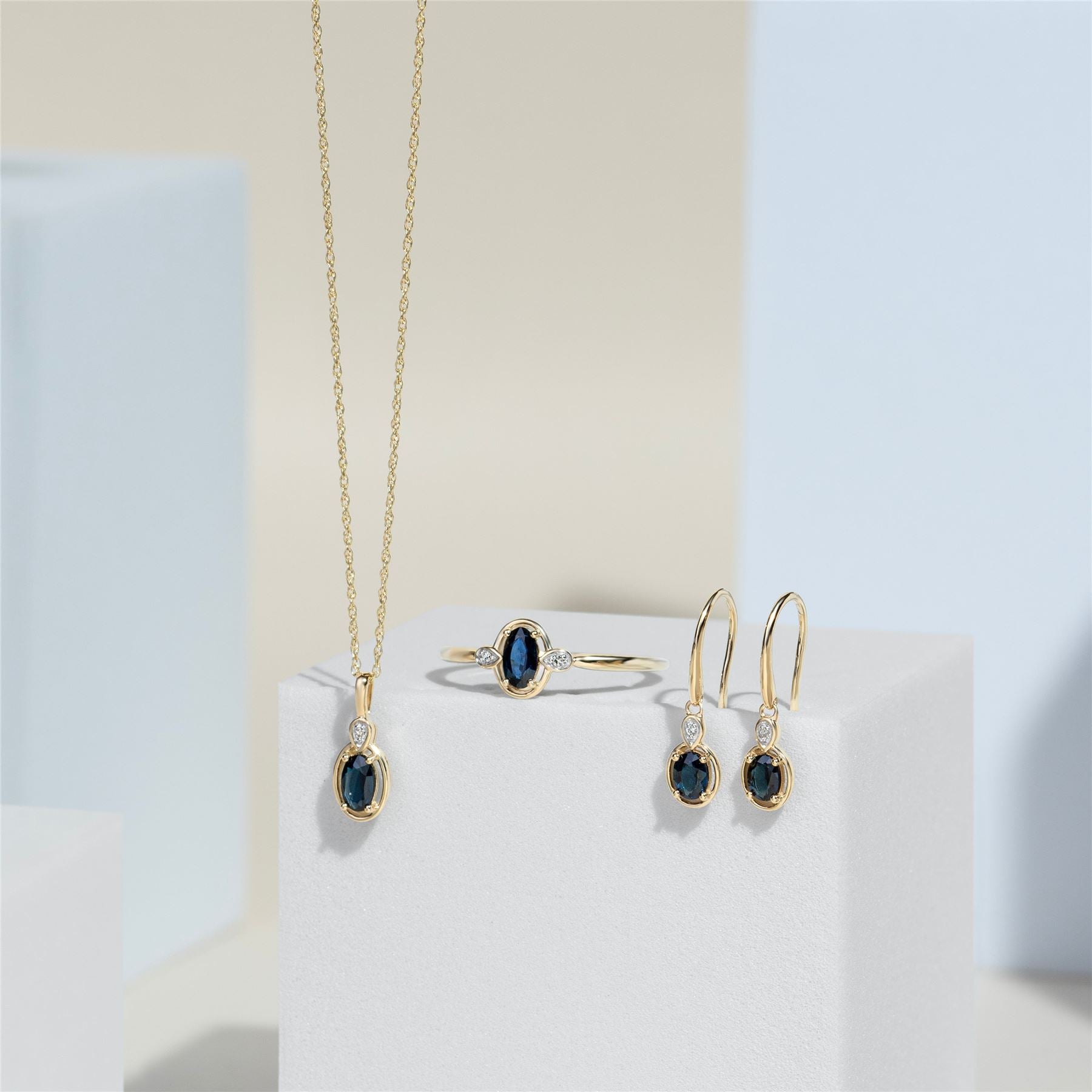 Classic Oval Sapphire & Round Diamond Ring In 9ct Yellow Gold