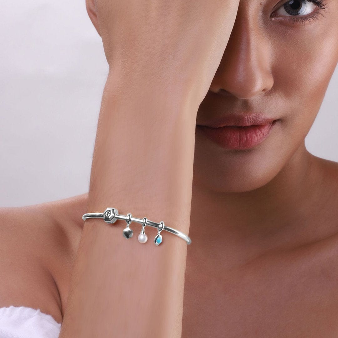 Achievement 'Rocking Future' Sterling Silver White Topaz Charm - Gemondo